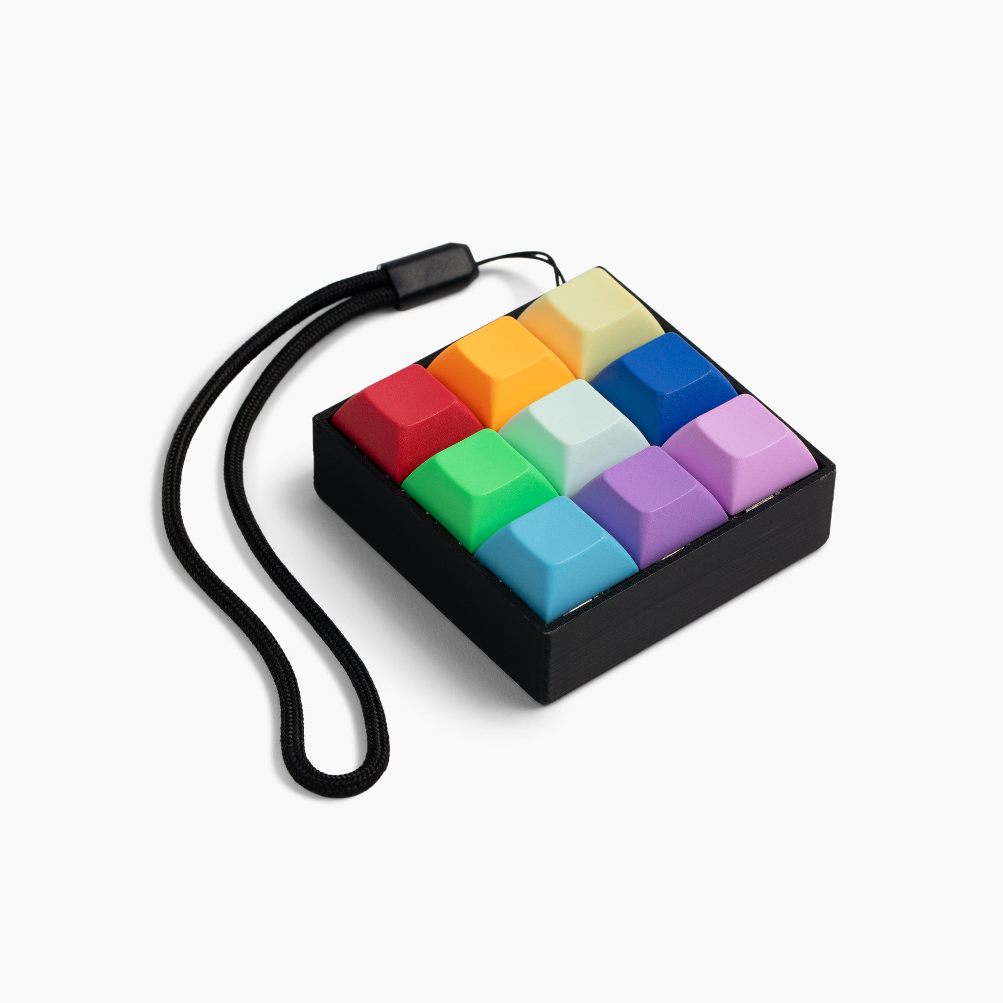 9 Key Mechanical Keyboard Fidget Toy in a Bright Rainbow Colorway