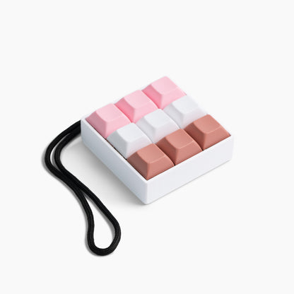 9 Key Mechanical Keyboard Fidget Toy in a Neapolitan Colorway